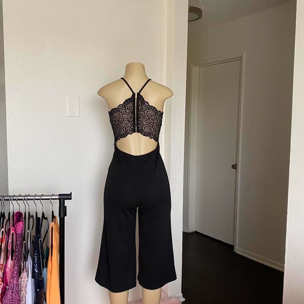 Black jumpsuit with open back